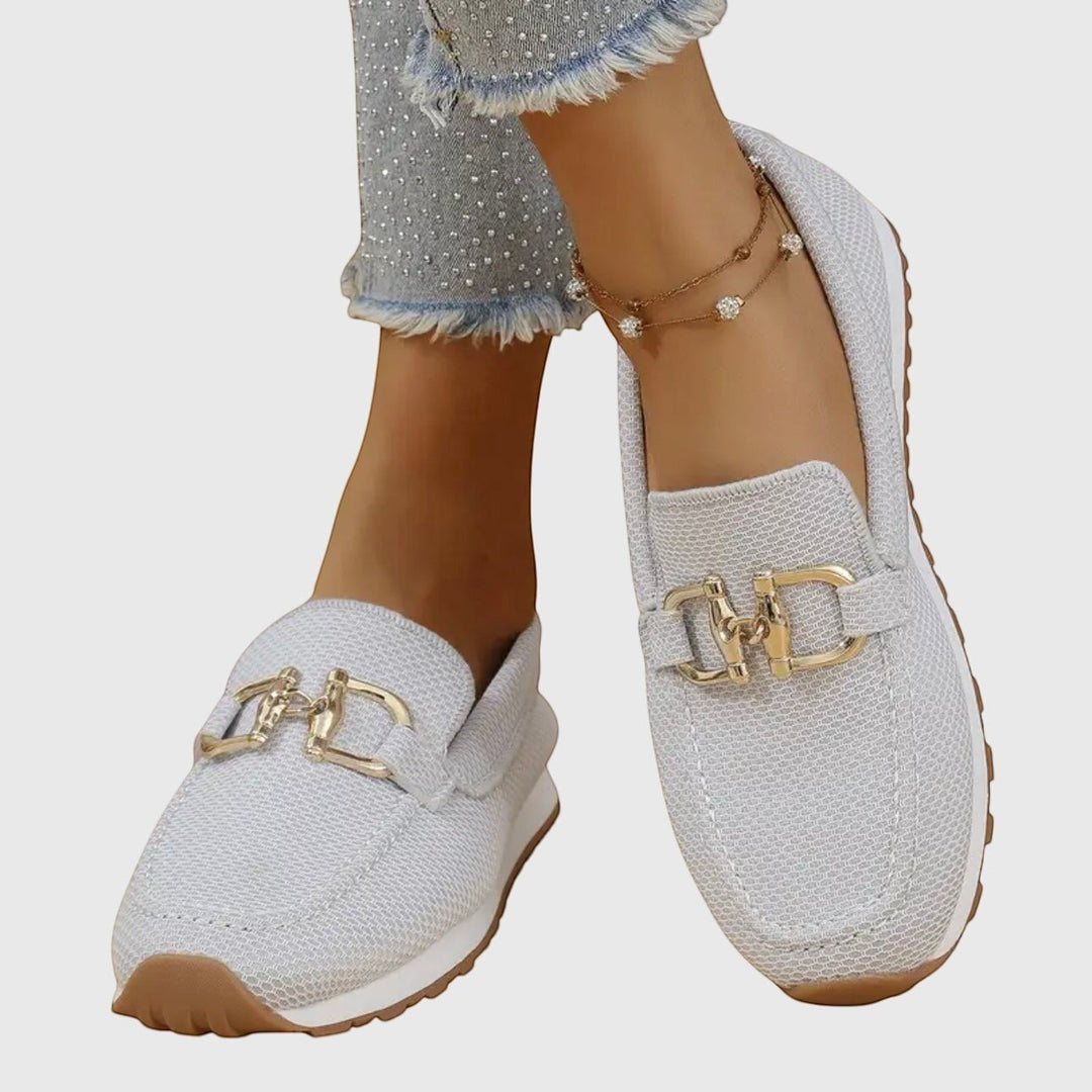Nora & Elise Susie light grey mesh orthopaedic moccasin trainers with gold buckle detail and non-slip sole.